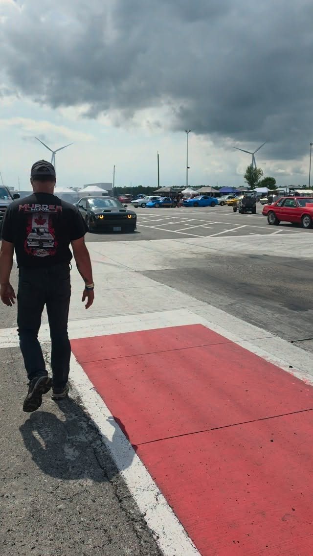 Racer walking the burnout box at TMP before a 6.0 class pass